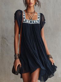 Apolline | Mini Dress in Embroidered Navy Blue Floral Mousseline